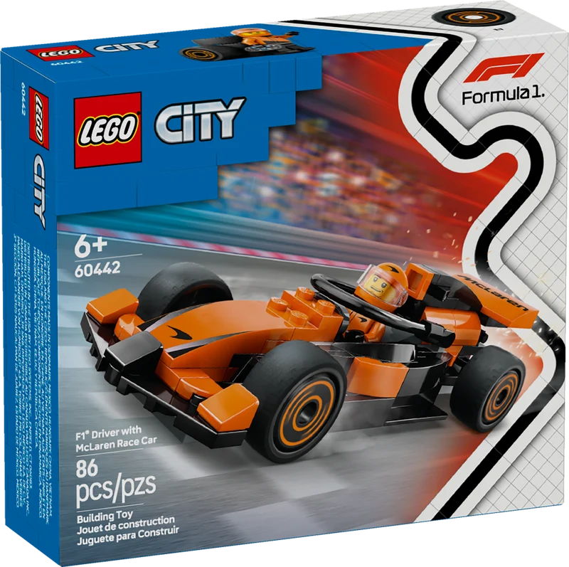 Le pilote de F1® avec la voiture de course McLaren