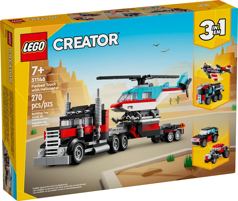 Le camion à plateforme avec un hélicoptère